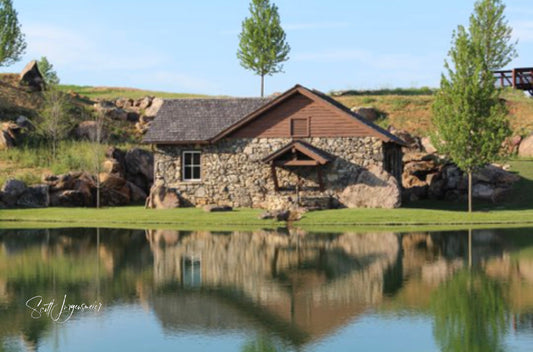 Small cabin in front of pond in Branson, MO